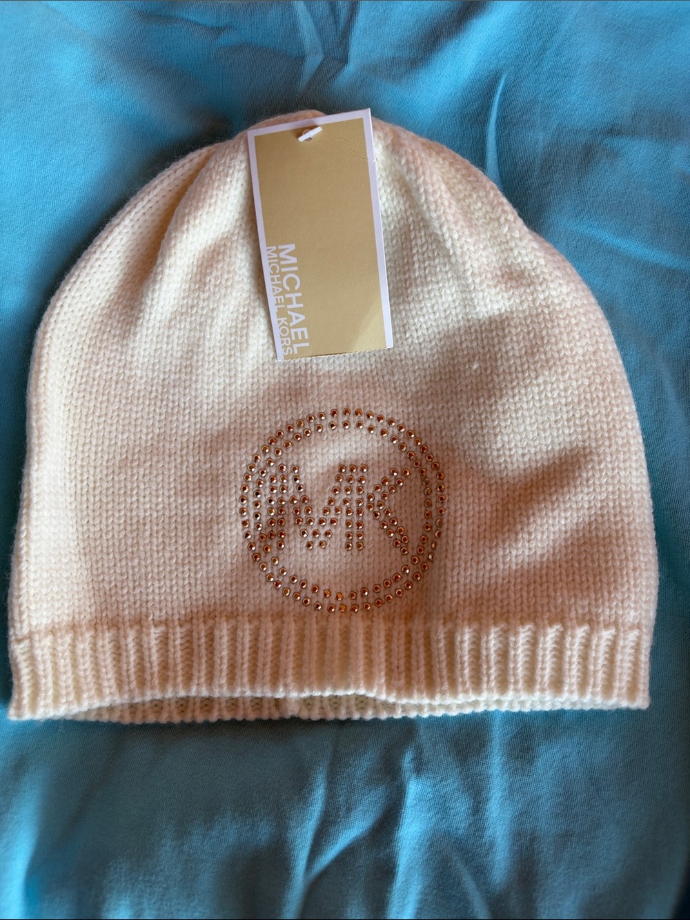 MICHAEL KORS Woman’s Cream Beanie with Gold MK Crystal Logo